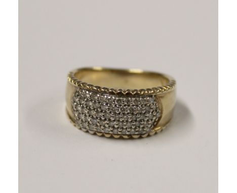 A 9ct yellow gold ladies' dress ring, pavé-set with white diamonds, size Q1/2, approx 7.5g.