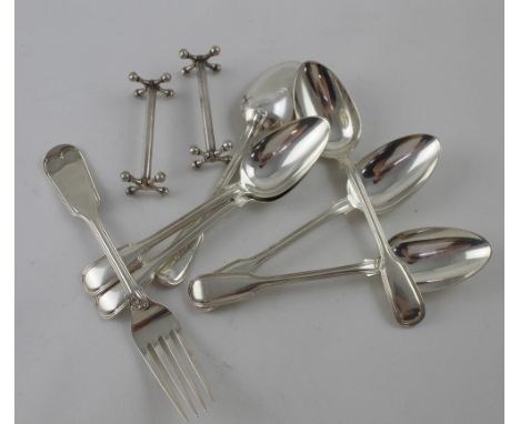 A William IV set of six hallmarked silver dessert spoons, possibly William Theobalds, London 1835 and a similar period single