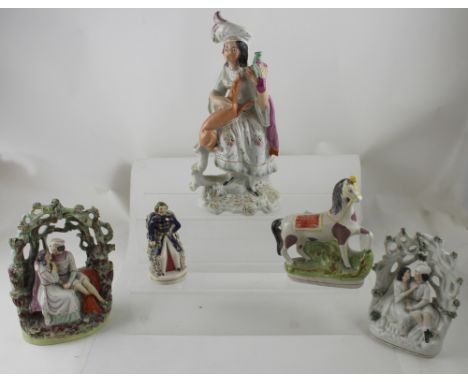 A group of five Staffordshire figures to include a courting couple within a bocage bower, a similar example of a courting cou