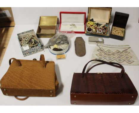 A quantity of vintage and contemporary costume jewellery, some contained in jewellery boxes to include clip-on earrings, faux