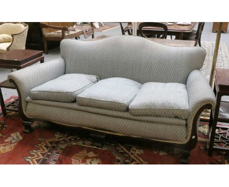 A 1920's Mahogany Framed Three Seater Sofa, with shaped back and scroll arms, 180cm wide