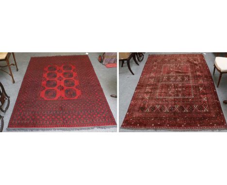 Afghan Turkmen Ensi Rug, the field centred by a panel of candelabra motifs enclosed by multiple borders, 242cm by 163cm, toge