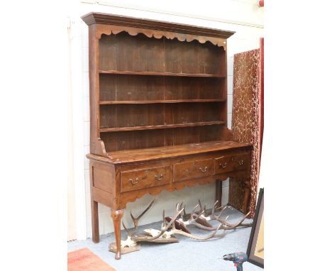 An 18th Century Yew Wood Dresser, 177cm by 50cm by 207cmChips to the top of the corniceRepair to the top apron - right hand s