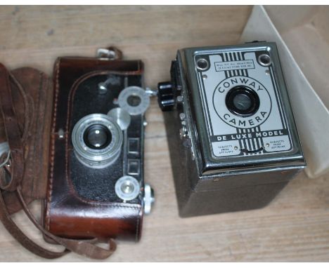 Two vintage cameras, Argus and a Conway De Luxe Model. 