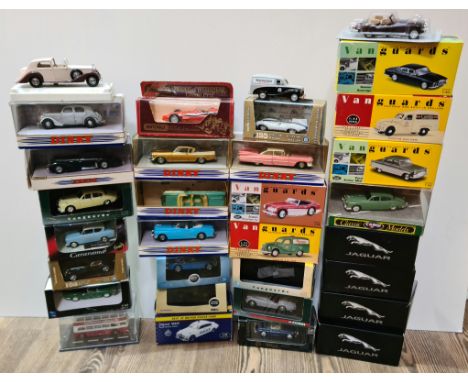 A box of boxed vehicles including Brumm series, New-Ray Jaguar models, Original Omnibus Company, Atlas Editions police car, C