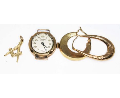 A mixed lot comprising a 9ct gold Bentina watch, a hallmarked 9ct gold Masonic pendant, an odd earring marked '375' and anoth