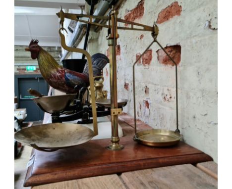 A set of brass balance scales. 