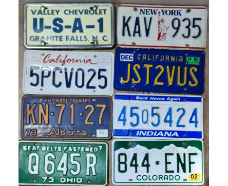 A collection of 8 US car plates to include North Carolina, Colorado, Ohio, Indiana, Alberta, New York and 2 California. 