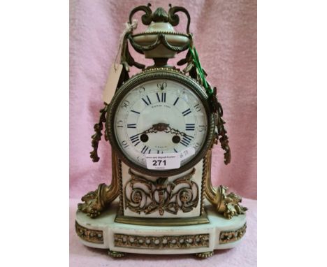 A 19th century French ormolu and marble clock with enamel face and blue Roman numerals, with key and pendulum, made by Raingo