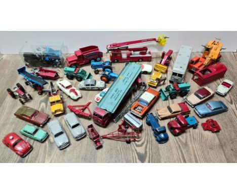 A box of playworn model vehicles including Corgi, Dinky etc and includes cars, fire engine, horsebox etc 