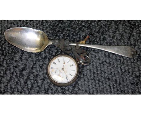 A hallmarked silver pocket watch and a Georgian silver desert spoon. 