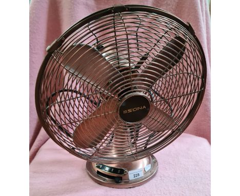 A vintage Sona copper effect desk fan. 