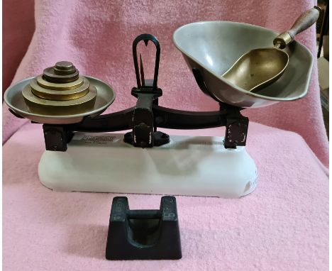 A set of Avery kitchen scales and weights. 