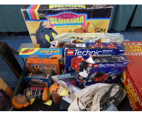 A Tray of Various Vintage Toys to Include Tom and Jerry Chad Valley Projector, Lego Technic etc