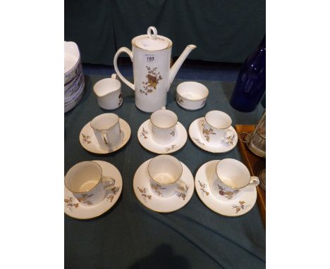 A Royal Worcester Coffee Service, Comprising Six Cans and Saucers, Coffee Pot, Sugar Pot and Cream Jug 