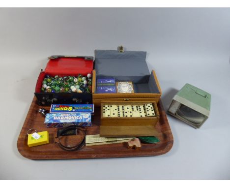 A Tray of Curios to Include Dominoes Set, Harmonicas, Vintage Marbles, Slide Viewer