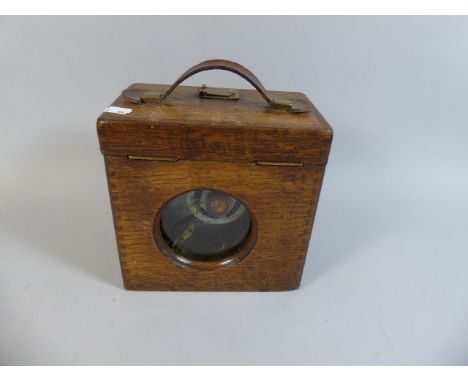 A Vintage Oak Cased French Pigeon Clock with Leather Carrying Handle 