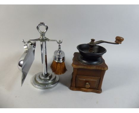 A Small Chrome Crumb Tray and Brush Set on Stand Together with a Small Coffee Grinder 