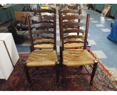 A Set of Four Framed Oak Seated Ladder Back Dining Chairs