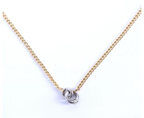 Hans Schindler, Soest, Duitsland, 18 kt. gouden met platina collier, bezet met een briljant geslepen diamant van 0.02 ct., kl