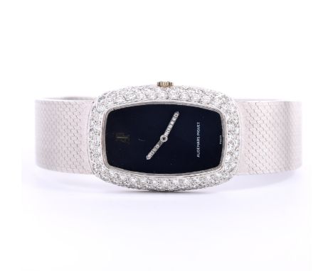 Audemars Piquet, 18 kt. witgouden mechanisch dames polshorloge, de lunette pavé bezet met briljant geslepen diamant (kleur G-