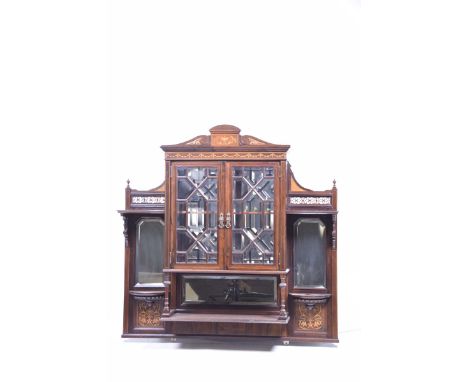 A Victorian rosewood wall cabinet,With an architectural inlaid pediment above a frieze inlaid with trailing harebells over tw