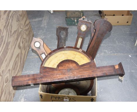 Six assorted 19th Century barometersTo include five banjo barometers also an arched barometer with a half moon dial.   CONDIT
