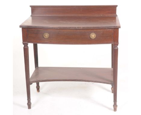 A 19th Century mahogany side tableThe bowfront top with a reeded border above a single drawer with brass ring handles raised 