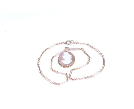 A cameo pendant and chainDepicting the profile of a Roman superior, weight of chain 9.5g