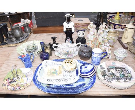 A large collection of ceramics, to include a pair of painted Parian figures, Continental candlestick in the form of a young c