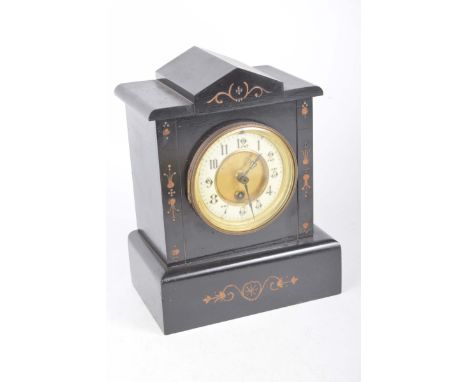 A black slate mantle clock, late 19th early 20th Century9.5cm dial with Arabic numerals, the works marked Medal Exhibition Un