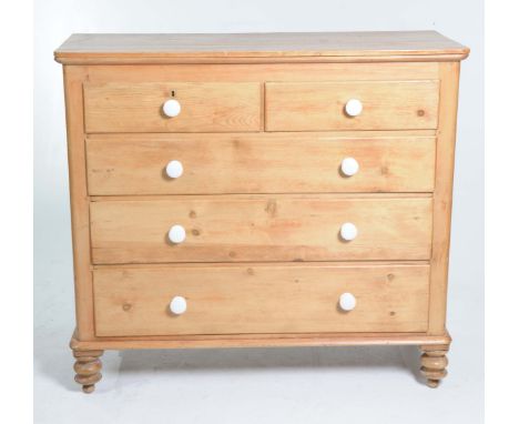 A Victorian pine chest of drawersThe rectangular top with rounded front corners above two short and three long graduated draw