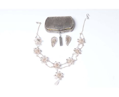 A continental white metal boxWith engraved decoration, bearing continental marks, together with, a filigree necklace, and sil