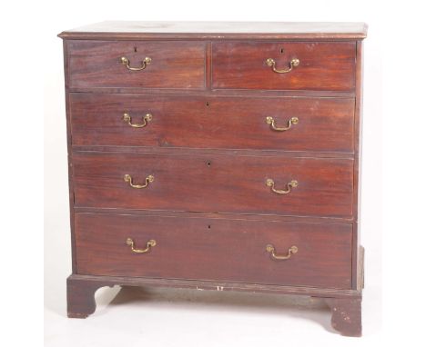 A Georgian mahogany chest of drawersWith a rectangular moulded top above two short and three long drawers each with later bra