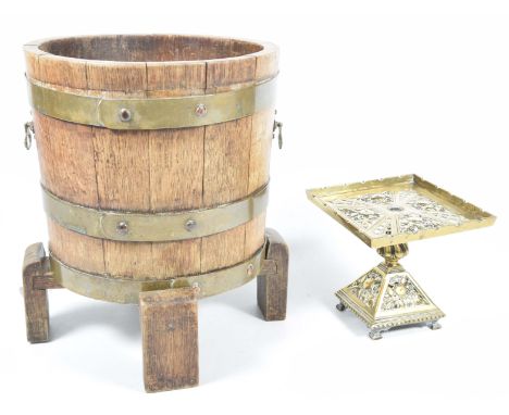 A brass bound oak planter on stand, early 20th CenturyHeight on stand 32cm, pierced brass trivet. (3)