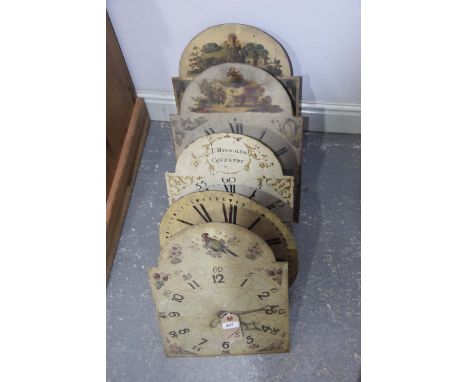 Four longcase clock dials complete with movements, also a wall clock with movementThe four break arched dials to include J Re