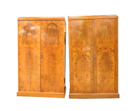 A near pair of Jones, Moss and Co Ltd walnut wardrobes, early 20th CenturyEach with a caddy top above a pair of quarter venee