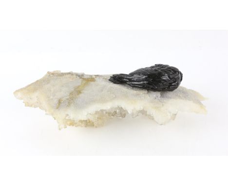 David Casini (Italian, b.1973). Untitled, 2004. Quartz crystal with ceramic sculpture, 13 x 35 x 11.5 cm. Provenance: From a 