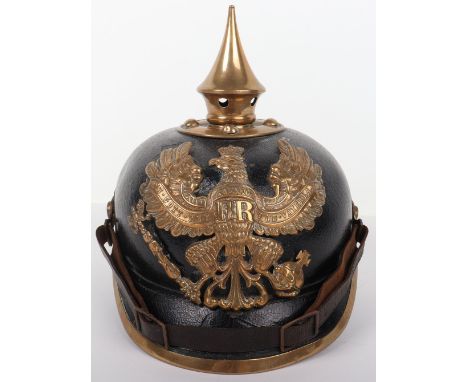 WW1 German Prussian Other Ranks Souvenired Pickelhaube, an interesting leather shelled helmet with standard other ranks brass