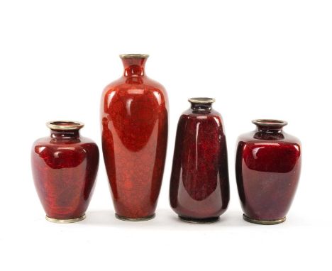 FOUR JAPANESE GINBARI ENAMEL BOTTLES, all with deep red glazes over foiled bases, largest 15cms (h) (4)Provenance: private co