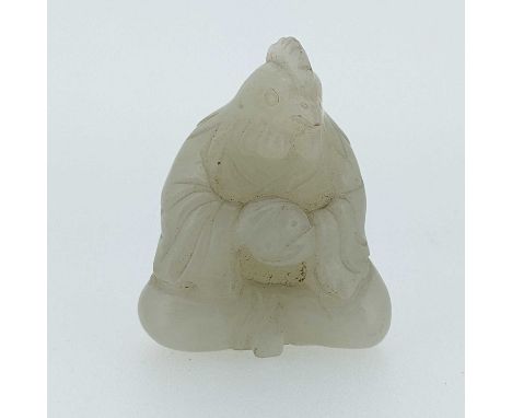CHINESE PALE JADE ROOSTER HEAD ZODIAC FIGURE, late Qing Dynasty or later, seated in robes holding a ying/yang symbol, togethe