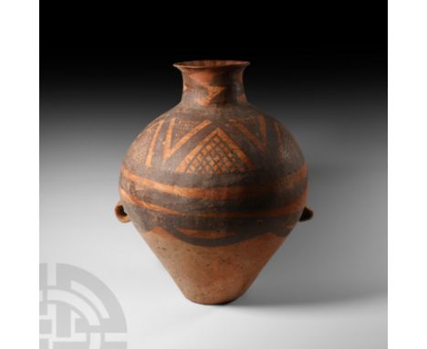 3rd millennium B.C. An ovoid ceramic jar or hu with cylindrical neck, everted rim and two downward-facing loop handles to the