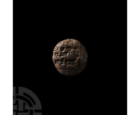 Early 2nd millennium B.C. &nbsp;discoid ceramic tablet with one domed face, bearing cuneiform scribal text to both faces, a l