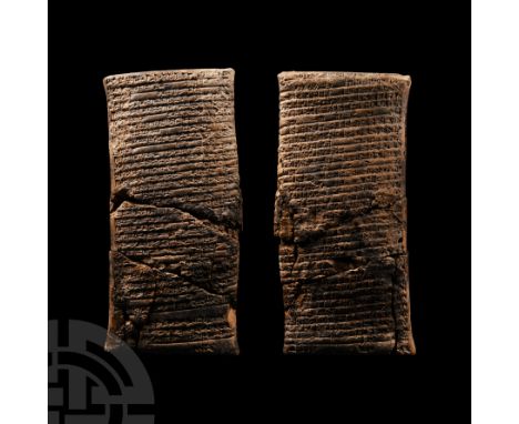 Early 2nd millennium B.C. A large pillow-shaped ceramic tablet of biconvex cross-section, columns of cuneiform text to both b