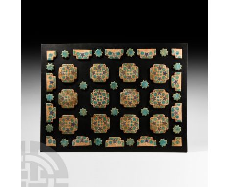 13th-14th century A.D. A mixed group of glazed ceramic floor tiles: 20 small star-shaped examples with blue glaze finish; 12 