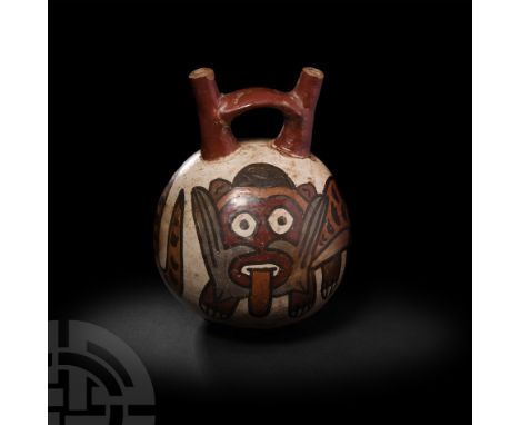 3rd-6th century A.D. A roughly spherical polychrome ceramic stirrup bottle, featuring two tapering cylindrical necks joined b