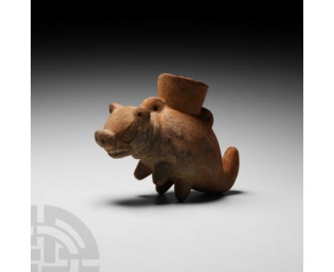 3rd century B.C.-4th century A.D. A zoomorphic ceramic phial modelled in the round, standing on four stub legs, flared neck w
