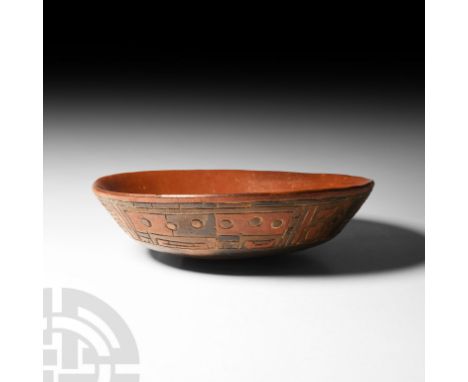 Circa 5th-3rd century B.C. A polychrome ceramic bowl with rounded base, deep frieze around the upper body composed of incised
