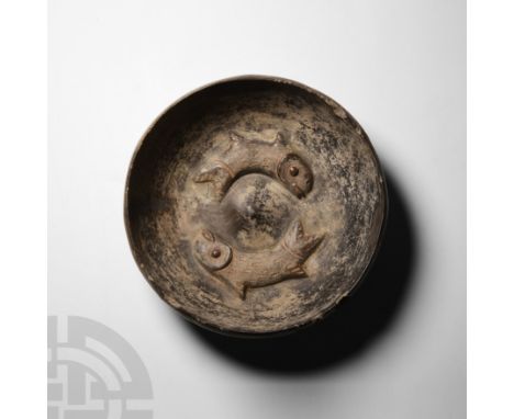 11th-15th century A.D. or earlier. A ceramic bowl with squat, D-section wall, inverted rim and kick-up to base; geometric fri