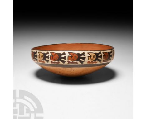 Circa 3rd-6th century A.D. A polychrome ceramic bowl with a carinated body and inverted rim, decorative frieze around the upp